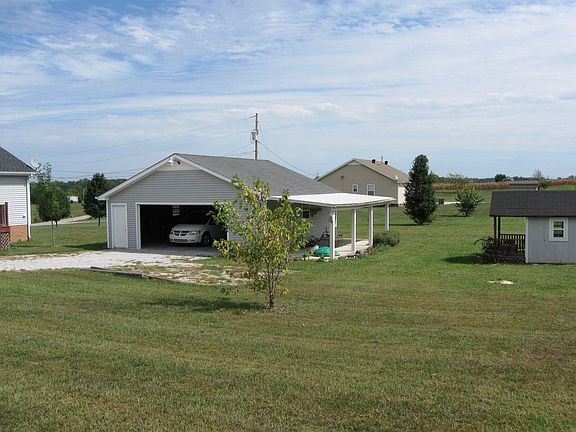 back yard with garage