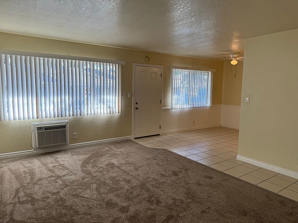 Large living room with new carpet