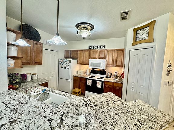 4th image of 8397 38th Street Cir E Unit 104