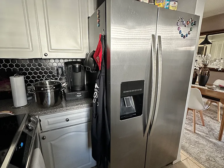 Another View of Fully Renovated Kitchen with large Stainless Steel Refrigerator