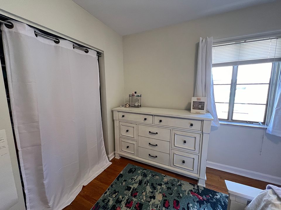 nice sized bedroom with hardwood floors