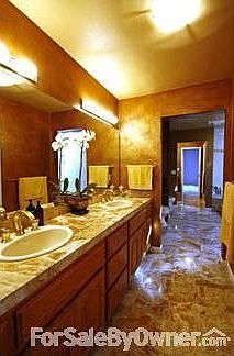 Master Bath
						:
						Walk in closet, double sinks, jacuzzi tub, sky light, and bidet.