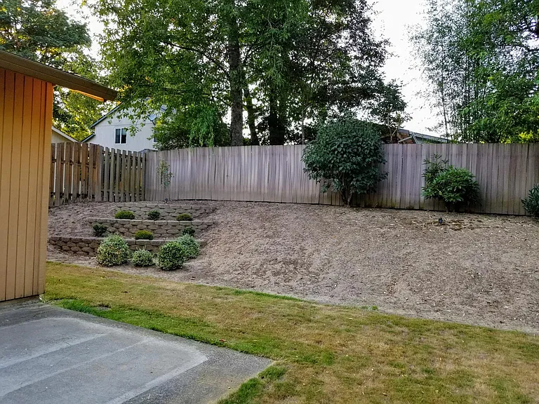 Quiet backyard is great for grilling on the patio or relaxing.