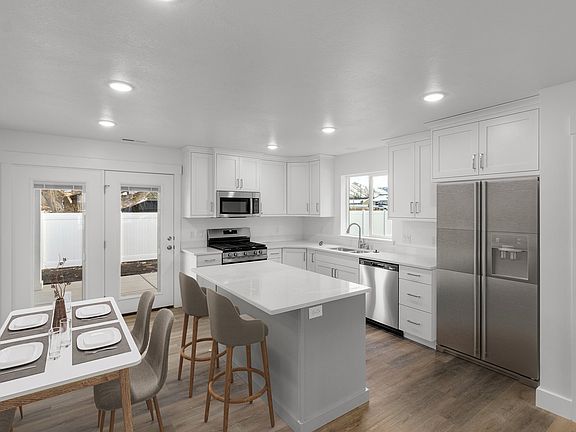 The photos are staged and may not reflect the current condition or contents of the property.