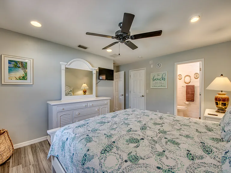 Primary/Master bedroom and bathroom with shower, walk-in closet
