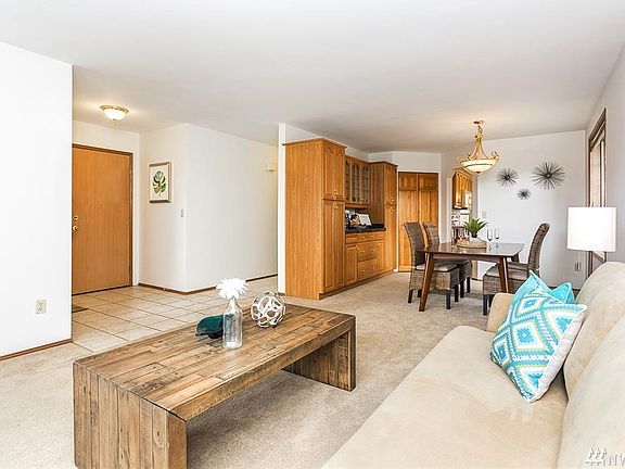 Front room is open to formal dining room.