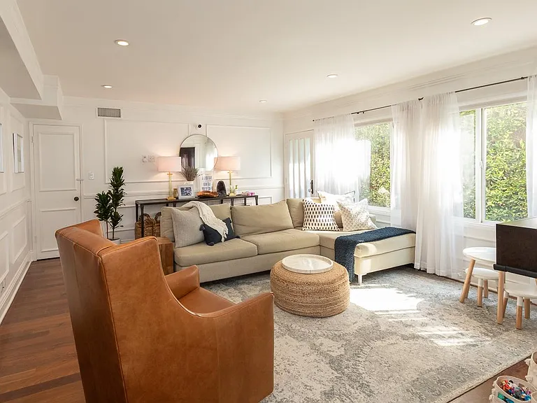 Living room with lots of windows and light