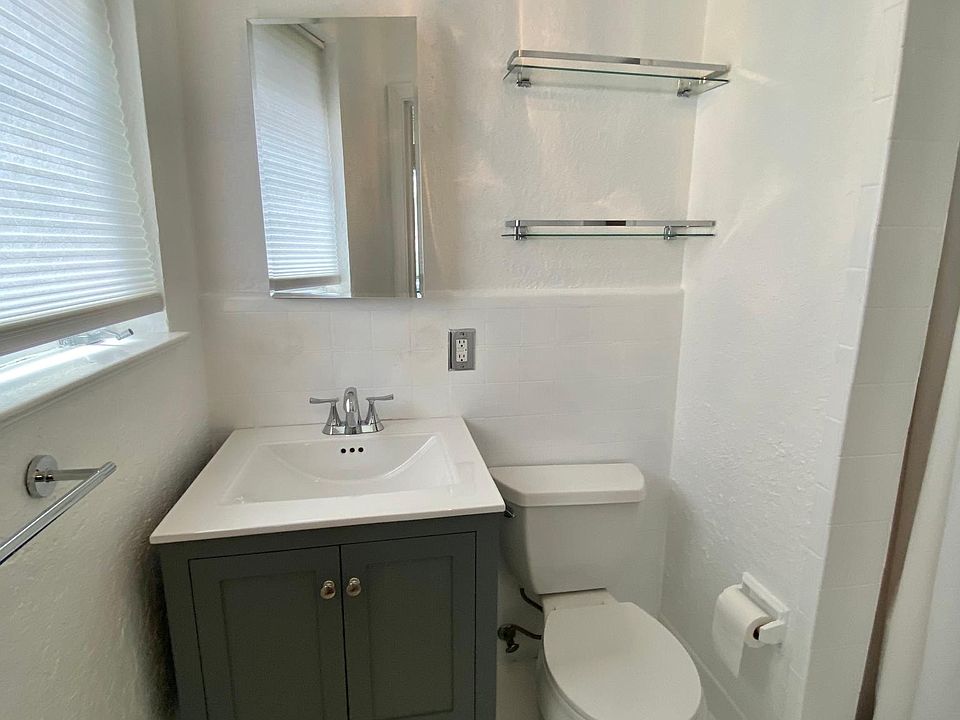 Clean and neat bathroom with standup shower (no tub.)
