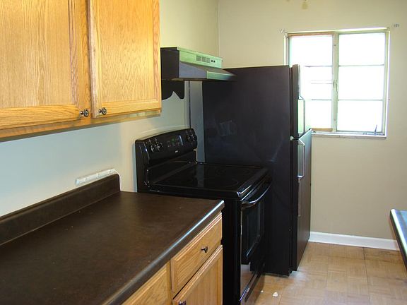 Kitchen - includes refrigerator and stove
