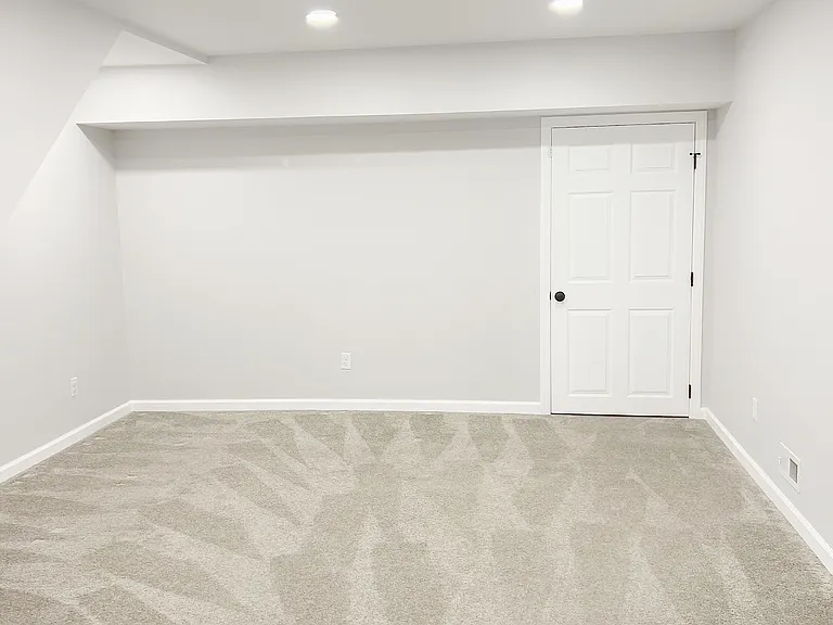 Finished Basement (Door to storage area)