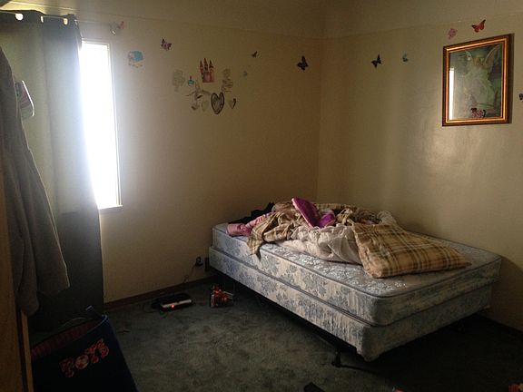 OLD PICTURE. Bedroom #2. Expect new paint, hardwood floors