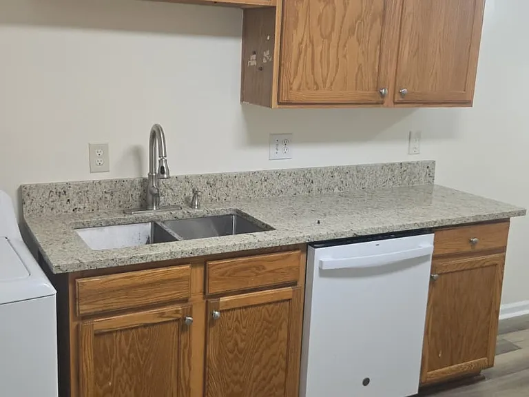 New faucet and marble countertops.