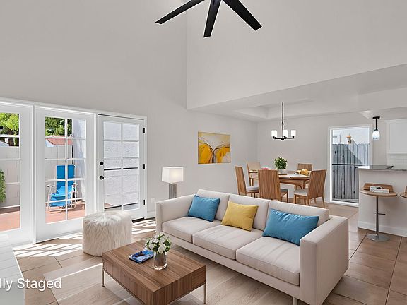 virtually staged living room/dining/kitchen