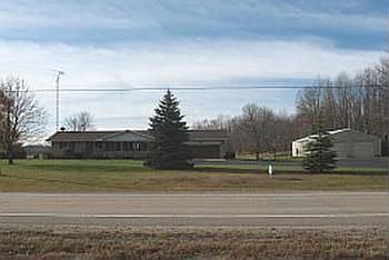 A beautiful home with large Pole Barn.