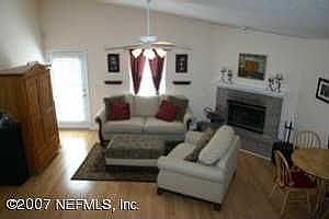 Open floorplan with vaulated ceilings & beautiful wood floors.