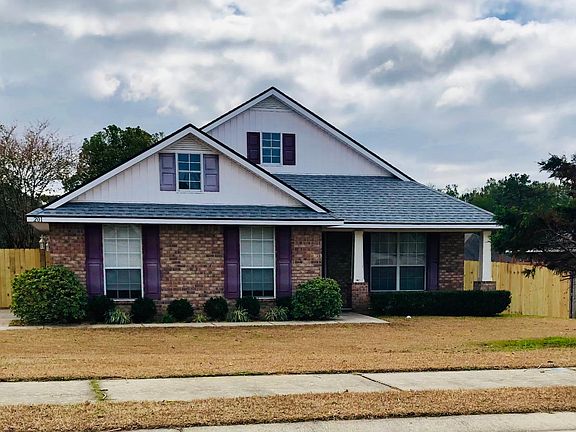 House has large fenced yard