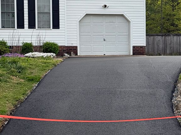 New Driveway 04/21/2025. NO HEAVY VEHICLES ALLOWED. It will dent and will be required by tenant to repair.