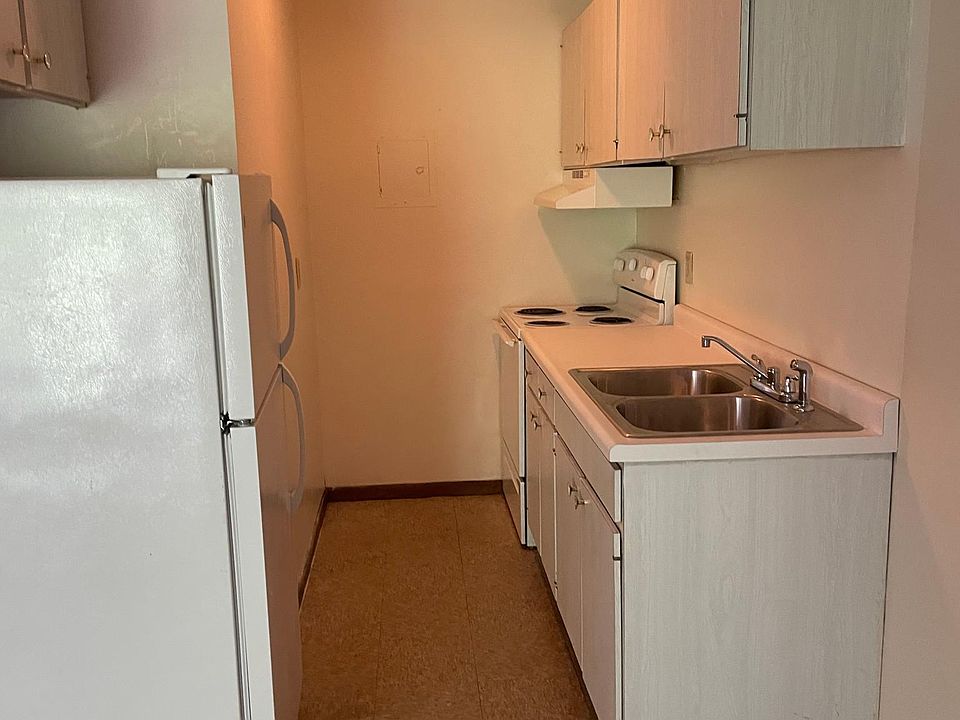 Galley kitchen with new countertops
