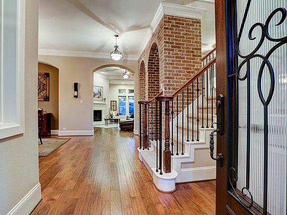 Upgraded hardwood floors in the entry, dining, study, family and master bedroom.