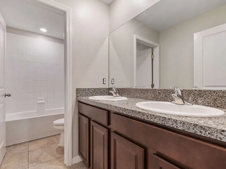 7407 Rosy Periwinkle Ct — Photo 20