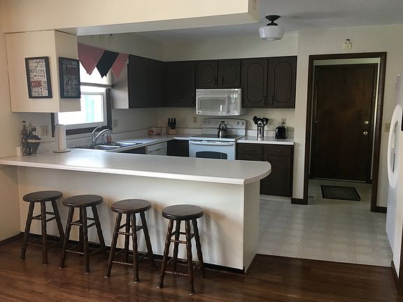 Kitchen with Bar and Stools