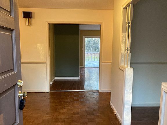 Looking in front door 