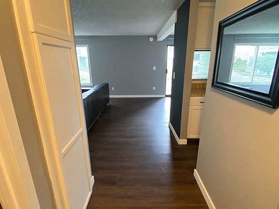 Pantry/storage on the left, kitchen to the right