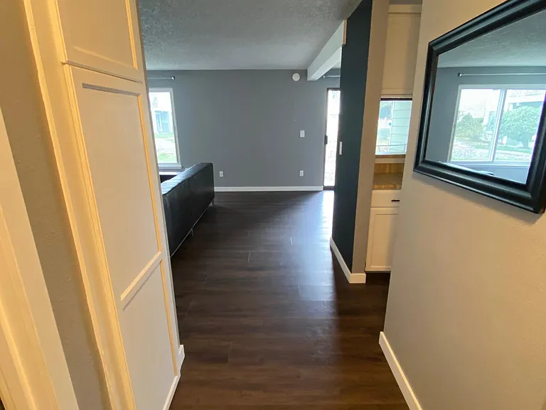 Pantry/storage on the left, kitchen to the right
