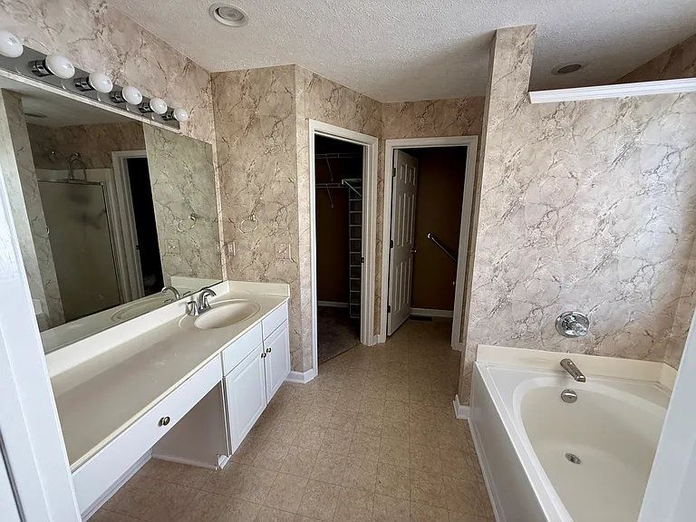 Primary bath with shower and garden tub