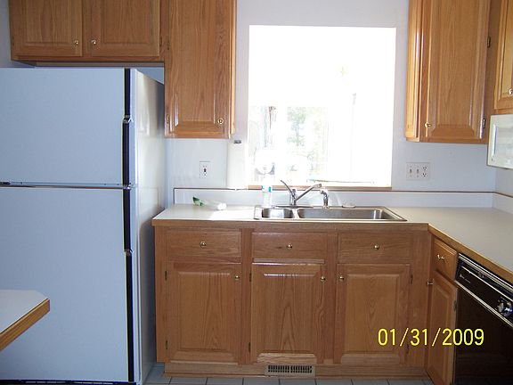 Kitchen looking into Sunroom