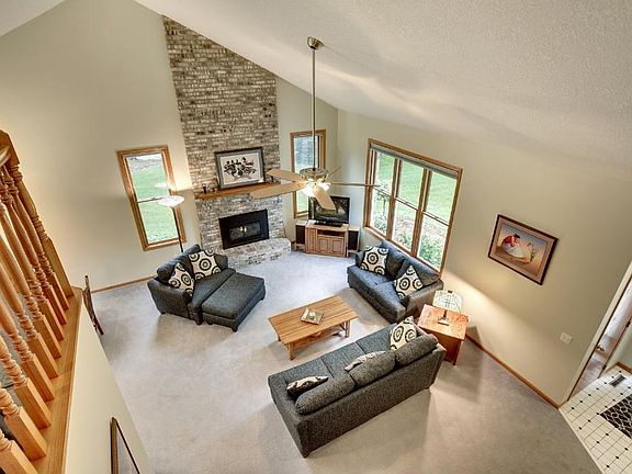 2-Story great-room with gas fireplace and floor to ceiling fireplace.