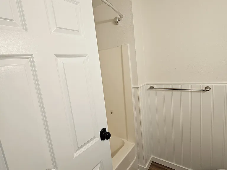 Hall bathroom with new cabinets, lighting, faucets, pretty much everything but the tub.