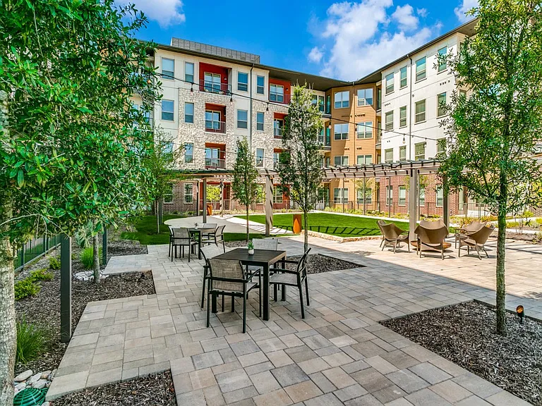 Outdoor courtyard with dining tables