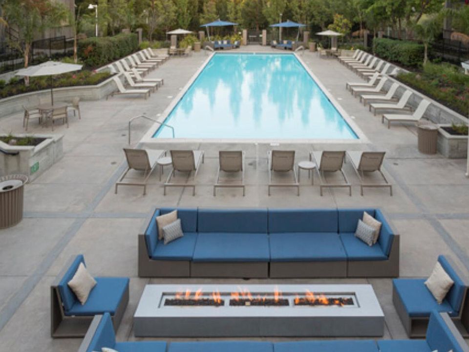 Swimming pool and lounge chairs. Outdoor showers also availa