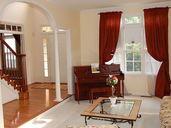 Arched hallway to living room