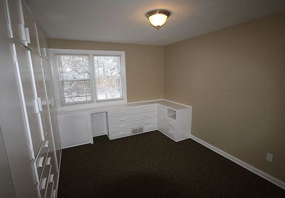 Bedroom with built in storage
