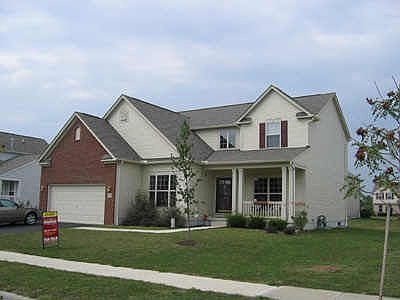 Stucco Exterior with Brick front.