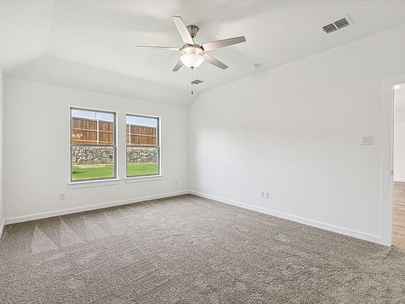 Primary Bedroom in in the Emmy II home plan by Trophy Signature Homes - REPRESENTATIVE PHOTO