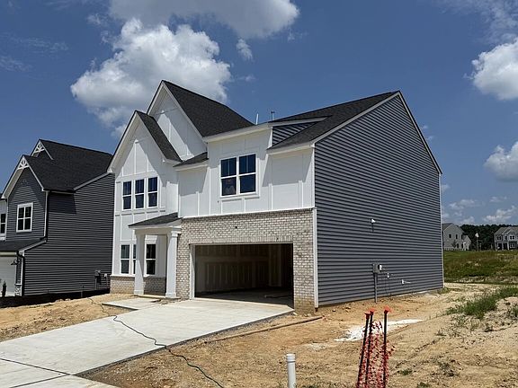 Exterior - Earthy tones and clean lines feel quietly inviting.