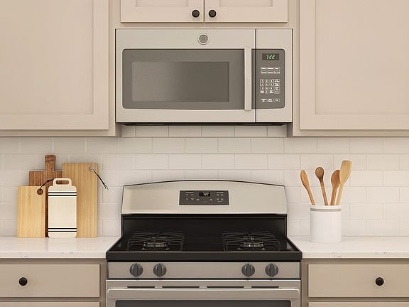 White tile backsplash in kitchen