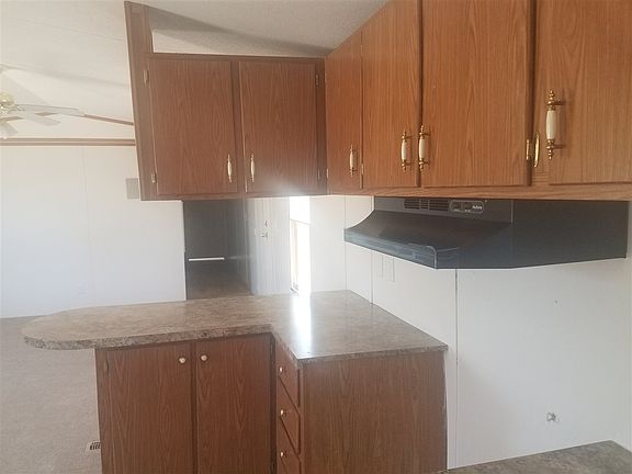 4th image of 13700 E 55th Dr