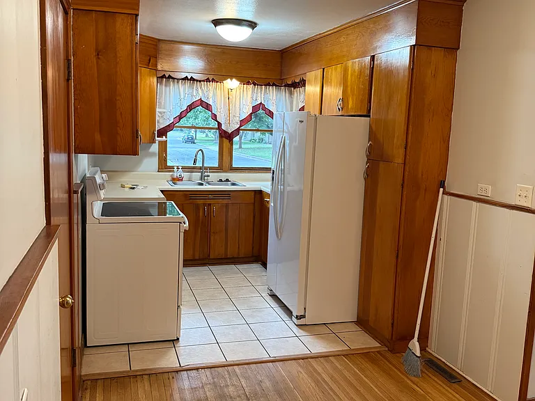 Kitchen (side by side fridge and glass top stove included)