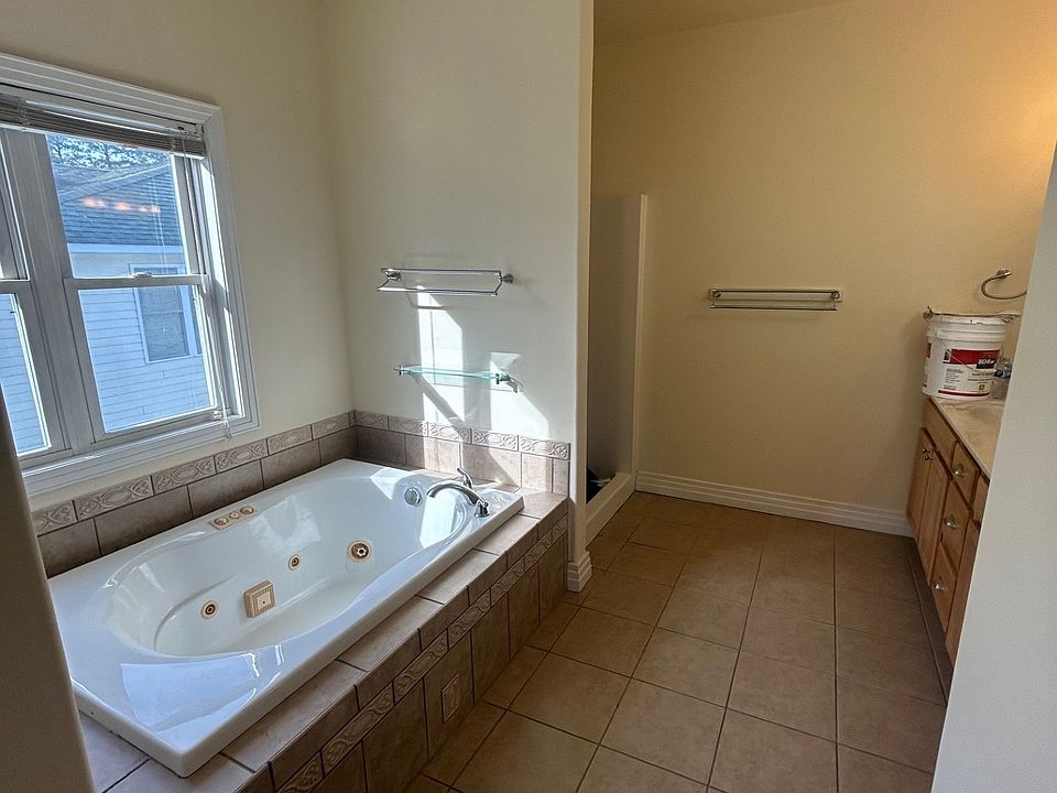 Main Bathroom on 3rd Level. Standing shower and Jacuzzi tub