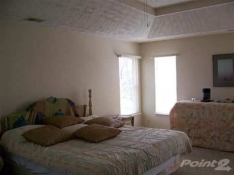 On SECOND Level: 14x20 BDR, Tray Ceiling. w/Full Bath, closets. PLUS Three other BDRs, Full Bath and