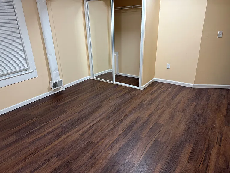 Master Bedroom with Mirrored Closet Doors