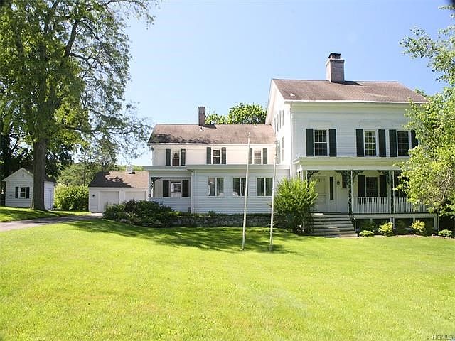 Quintessential country estate on Quaker Hill amidst 47 acres.