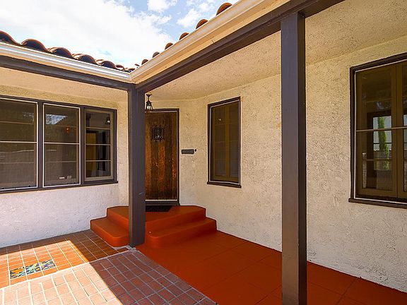 Front Door is set back from the front courtyard and front gate