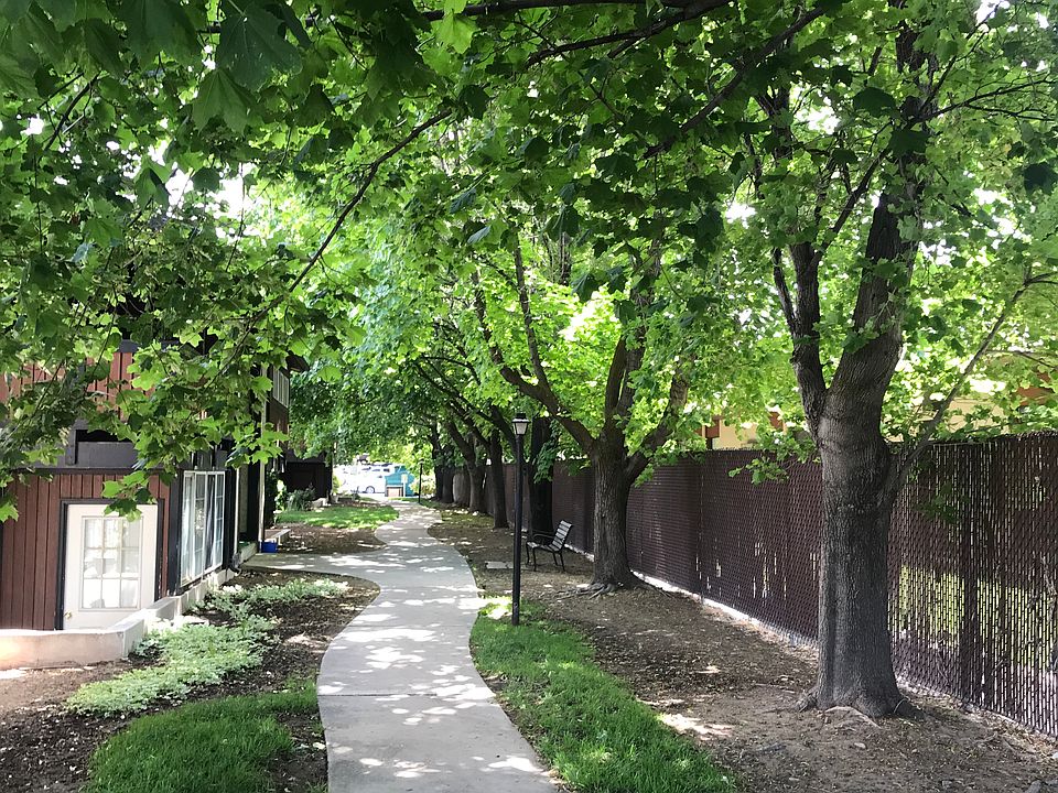 Peaceful walkway leading to unit.