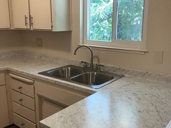 Brand new kitchen counters, sink, and faucet