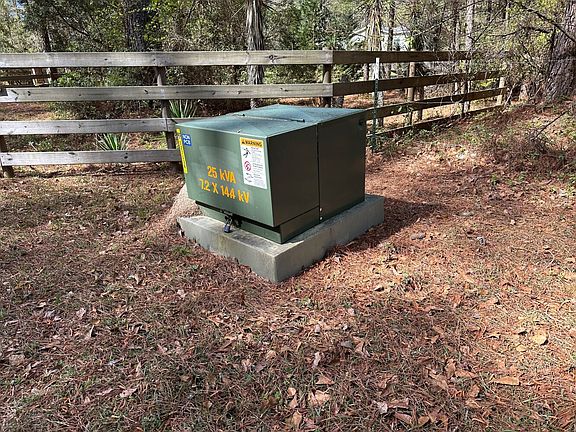 Underground power at the road frontage.